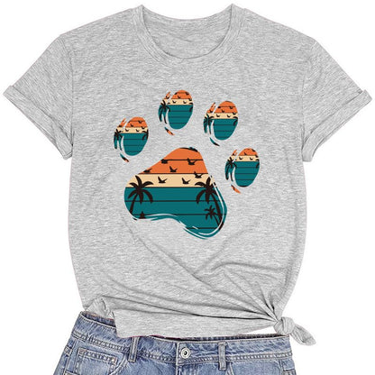 CORIRESHA Camisetas básicas informales de verano con estampado de huellas de perro y cuello redondo para mujer
